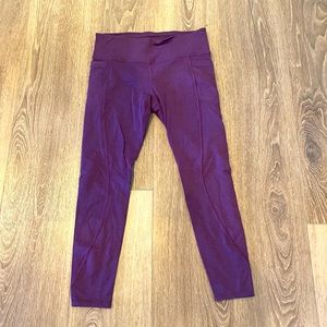 Size Large Athleta leggings. Berry color